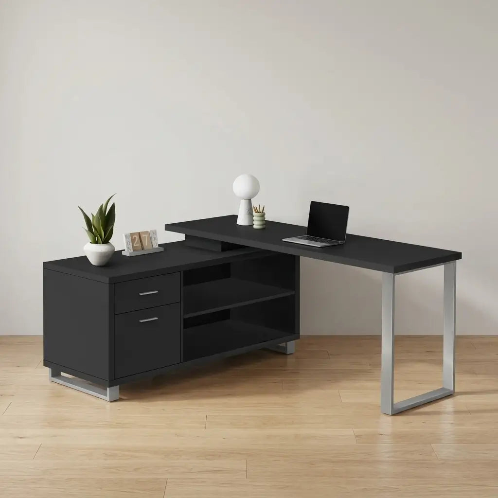 Grey laminate L-shaped corner desk with black metal support leg and open shelves