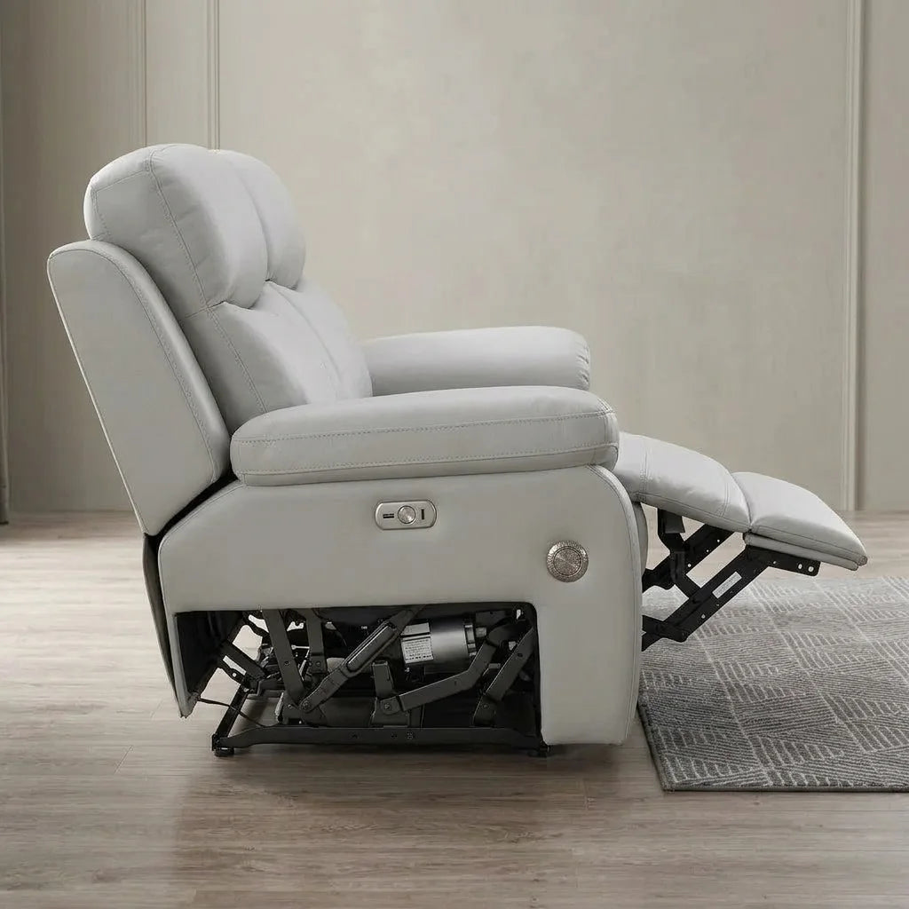Light grey leather power recliner chair with footrest extended