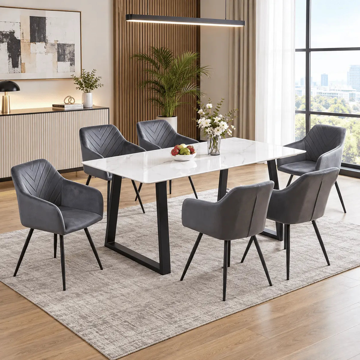 7-Piece Sintered Stone Dining Set featuring a snowy white marble-finish rectangular table, U-shaped steel legs, and dark grey velvet armchairs in a modern dining room