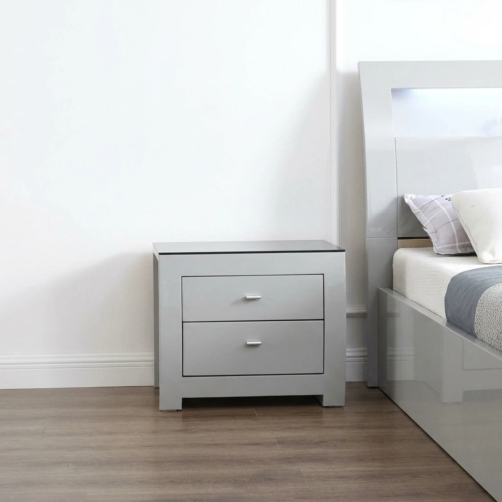Glossy dove grey 6-drawer double dresser with black glass top, silver handles, and matching wall mirror