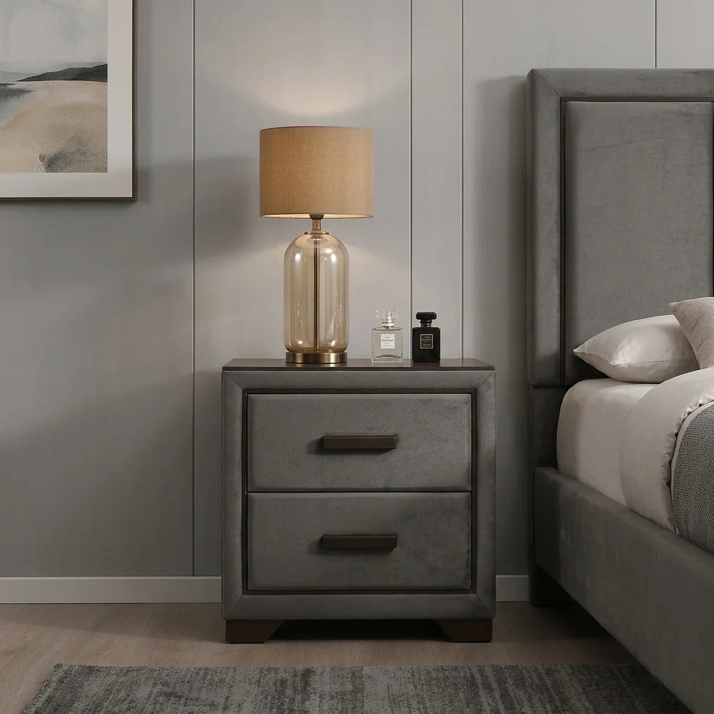 Grey upholstered 2-drawer nightstand with dark wood handles and warm bedside lamp matching IF-180 set