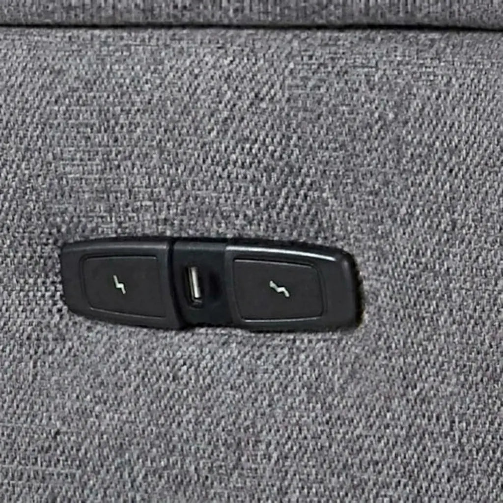 Metallic power recliner button with integrated USB port