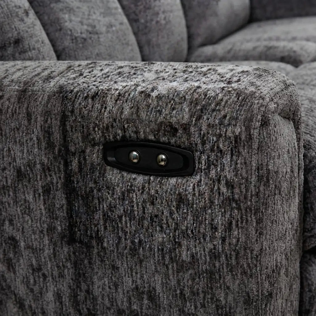 Close-up of textured gray woven upholstery and lift-up storage mechanism on fabric sectional