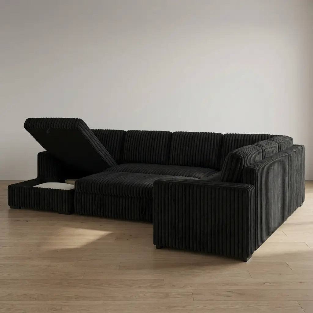 Contemporary black sofa with left chaise, plush seating, and hidden storage that converts into a bed for guests