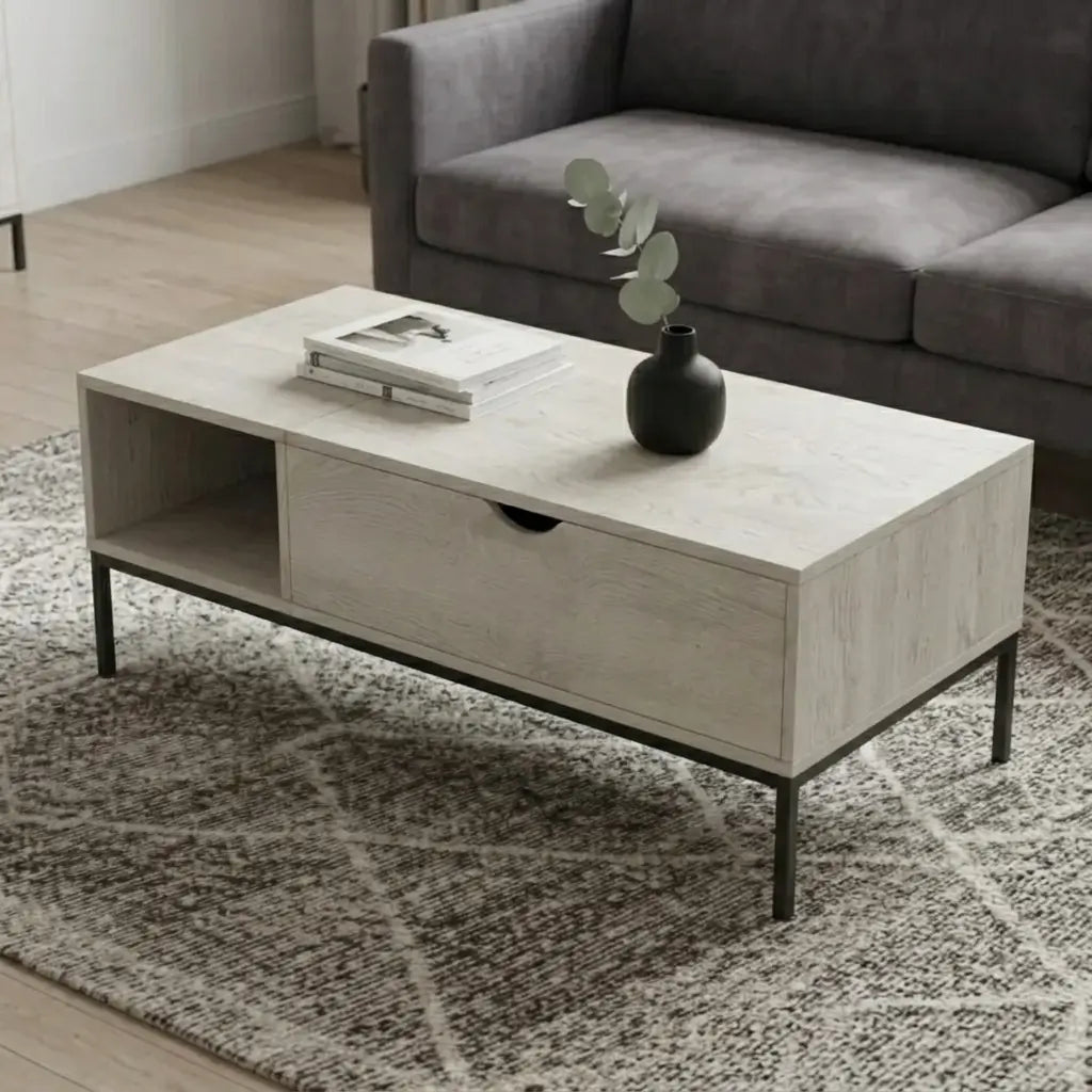 Washed oak laminate lift-top coffee table with black metal sled-style base and open side shelf in a modern living room