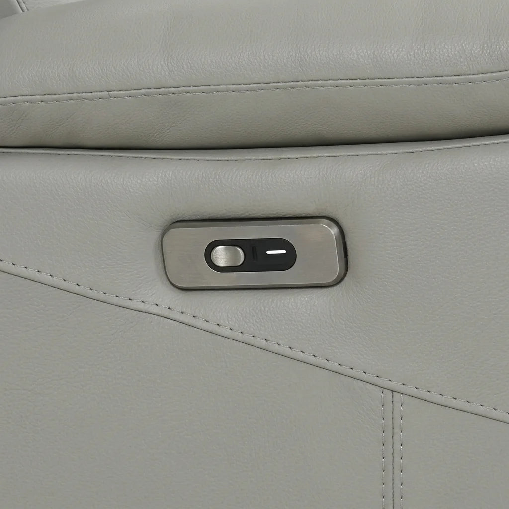 Close up of metallic power recliner button with USB