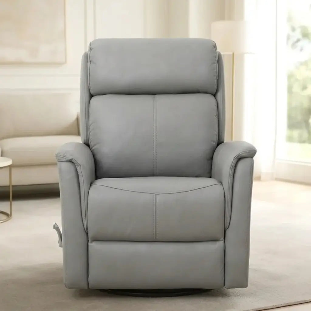 Pewter grey glider rocker recliner with padded seat and back, hardwood frame, and manual reclining function in a home setting