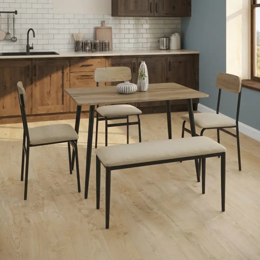 Compact 40-inch dining table with warm oak-look top, black metal legs, and four matching chairs with cushioned seats in an apartment