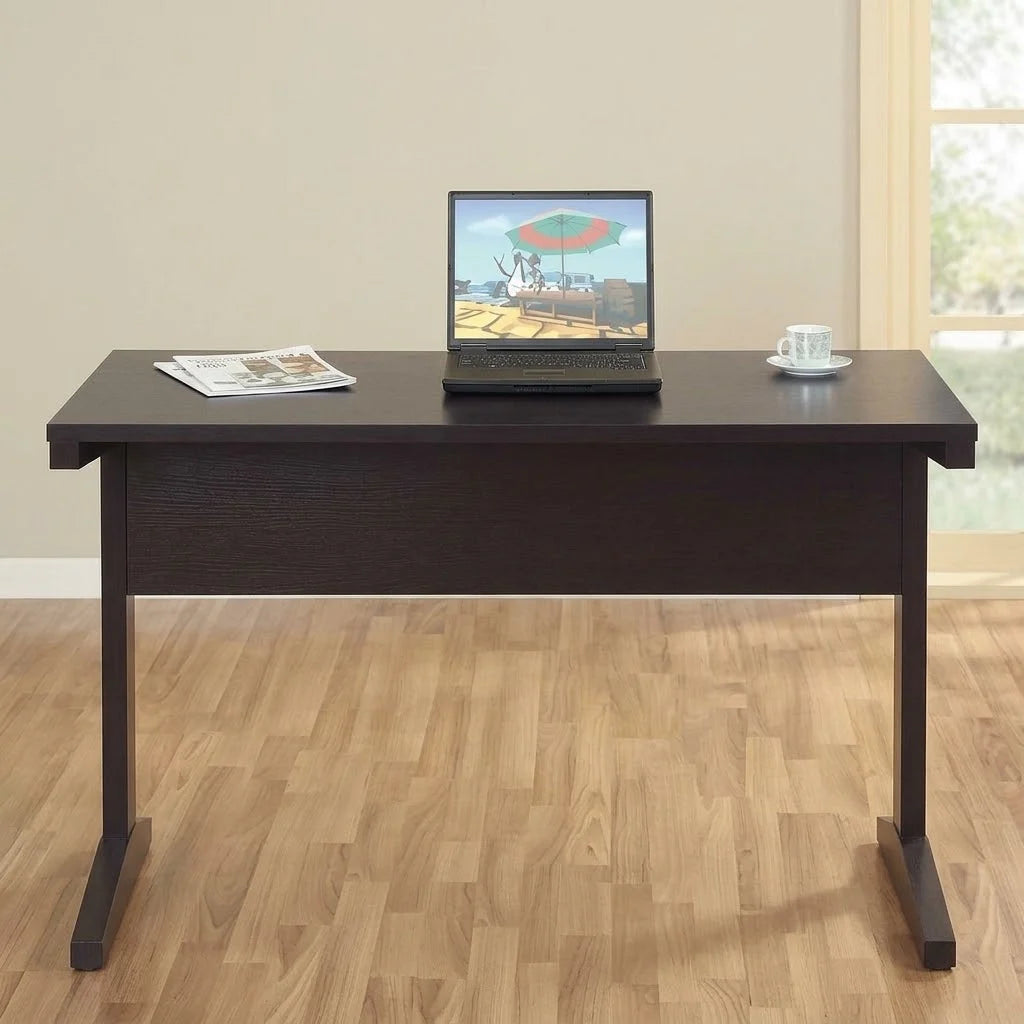 Espresso wood computer desk with spacious desktop and sturdy L-shaped legs in a home office setting   