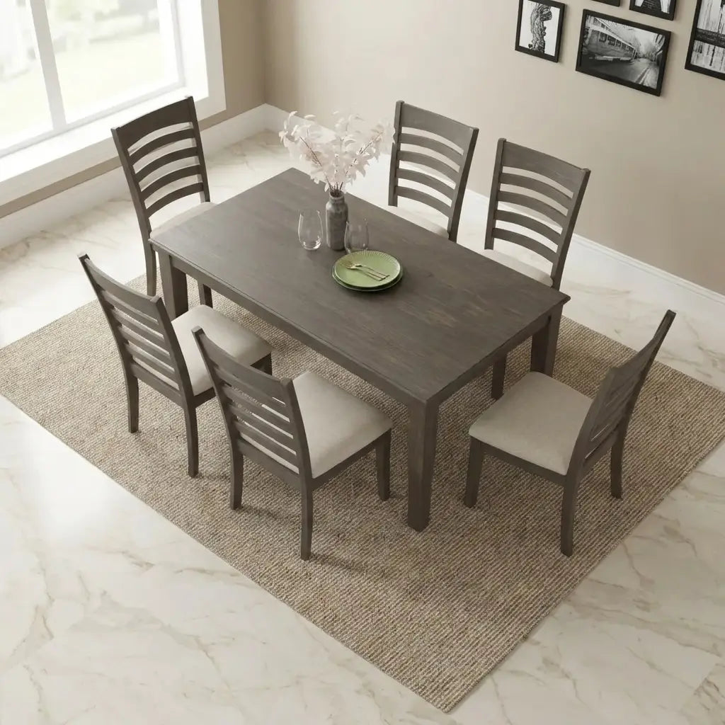 7-Piece Modern Extendable Dining Set displayed with the table extended to comfortably seat guests with stylish padded chairs