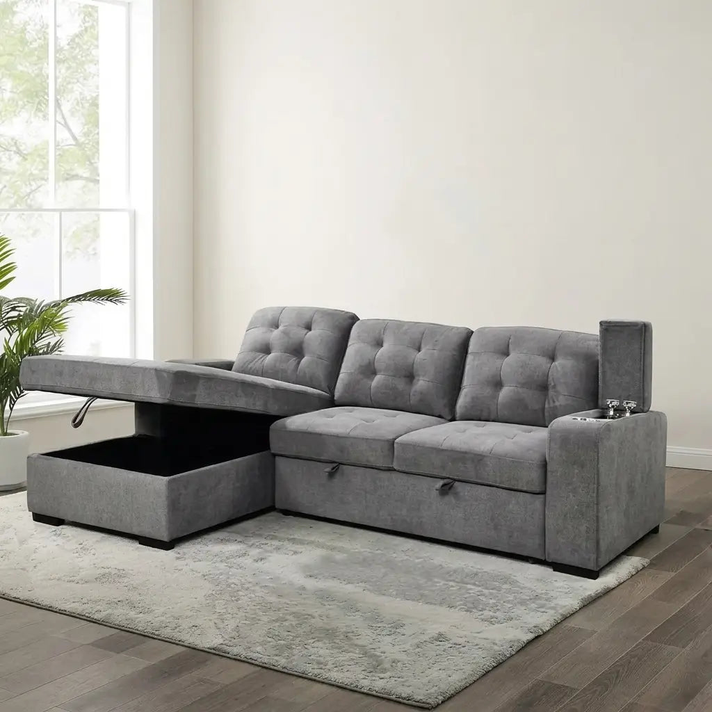 Space-saving grey sofa bed with adjustable headrests converted into a sleeping surface in a guest room or apartment