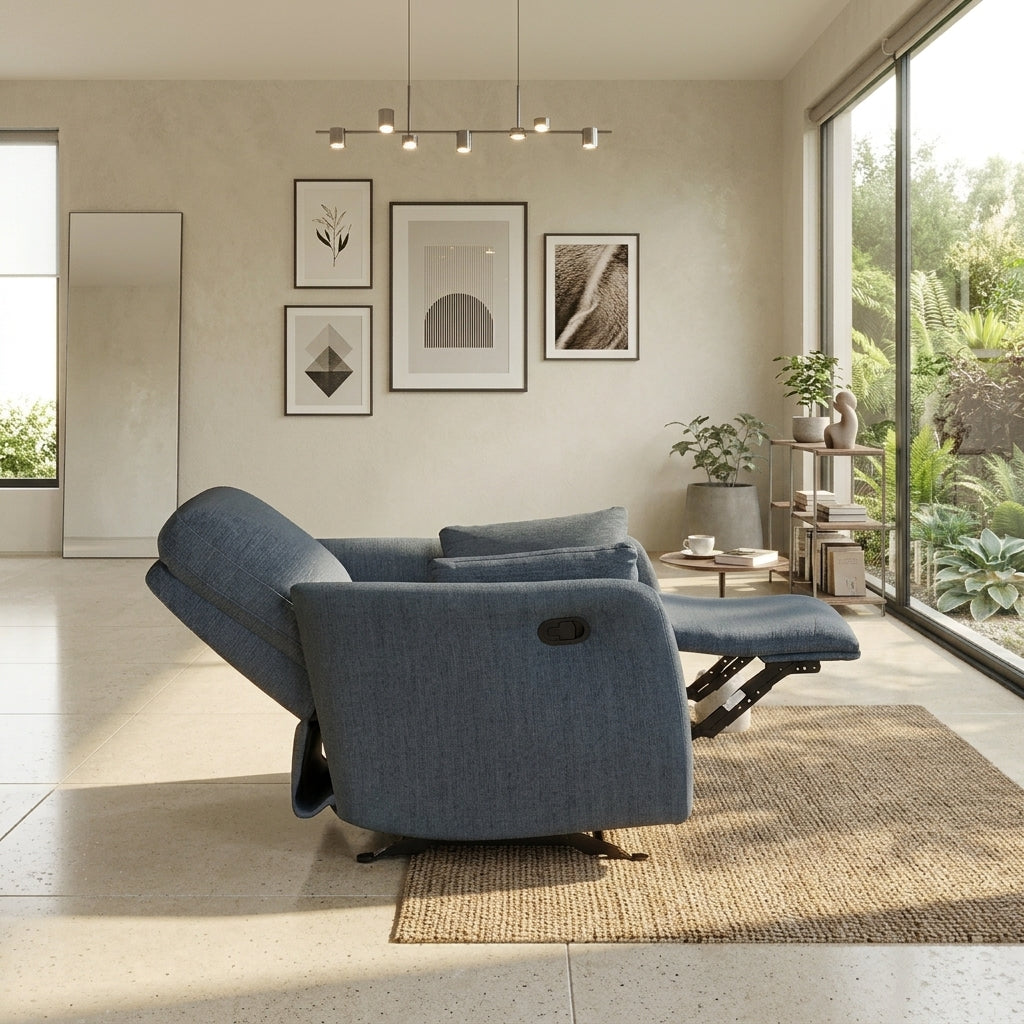 Angled side view of indigo blue fabric reclining chair in sunlit living room setting